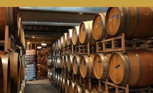 capabilities-regulatory-and-compliance-1 wine barrels at a winery in Pittsburgh who needs regulatory and compliance services